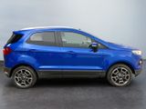 the blue ford eco - pace is parked in a parking lot