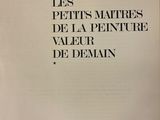 an old book with a black and white title on it