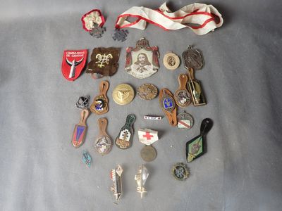 a lot of badges and pins on a table