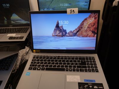 two laptops that are sitting on a table
