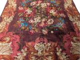 an image of a rug with a floral design on it