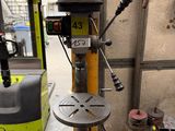 a machine that is sitting on a table in a garage