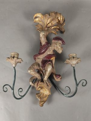 une photo d'une applique murale décorée d'un oiseau et de fleurs
