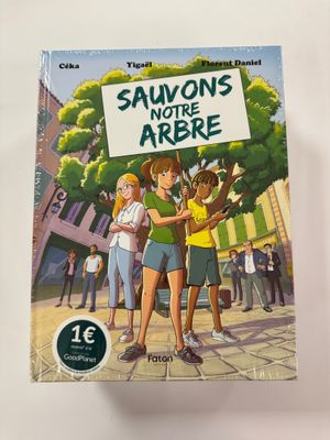 a book with a picture of a group of people standing in front of a tree