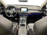 the interior of a car with a steering wheel, dashboard, and dashboard lights