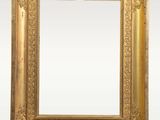 an antique gold frame with a decorative pattern on the edges