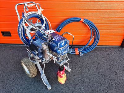 a picture of a blue and white airless paint sprayer