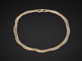a gold and diamond necklace, by business