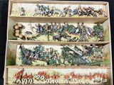 a lot of figurines that are on display in a box