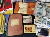 a lot of books that are sitting on a table