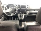 the interior of a car with a steering wheel and dashboard controls