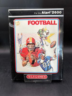 a close up of a box with a football game on it