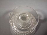 a picture of a plastic container filled with beads