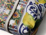 a bag with a floral design on it on a white surface