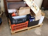 a pile of boxes and crates sitting on a pallet