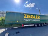 a truck that is parked on the side of the road