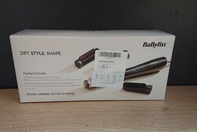 a box of babylis dry styler on a table