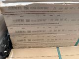 several cardboard boxes stacked on top of each other in a pile