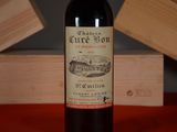 a bottle of wine that is sitting on a table