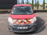a small red car with a yellow and red design on the front
