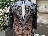 the back of a black lace top on a mannequin mannequin mannequin mannequin mannequin mannequin mannequin manne
