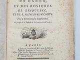 un livre ouvert sur lequel figure la photo d'un homme