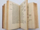 an open book that is sitting on a table