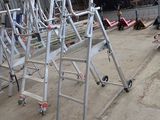 a metal ladder that is sitting in the middle of a building