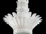 a white chandelier hanging from the ceiling