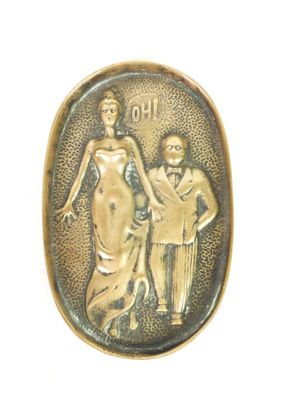 an image of a bronze plaque depicting a man and woman
