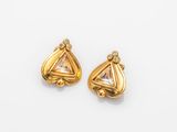 an image of a pair of gold and diamond earrings