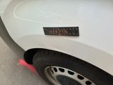 a close up of a sticker on the side of a car