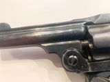 a gun that is on display on a table