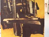 a picture of a painting on a easel in a room