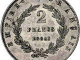 a silver two franc coin with a laurel wreath on the reverse