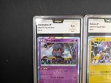 many different types of pokemon cards displayed on a table