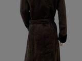 an image of a mannequin dressed in a brown coat and skirt