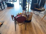 a chair and a table in the middle of a room