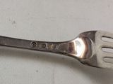 a fork that is sitting on a table