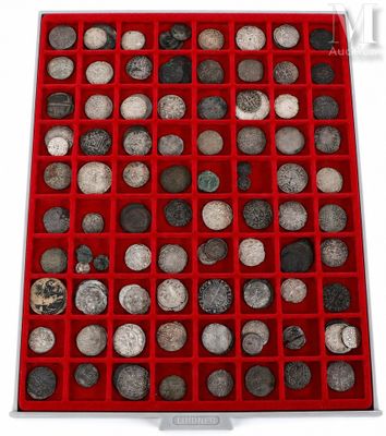 a red box filled with lots of rocks and pebbles