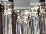 a lot of knives sitting on top of each other