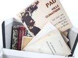 a box with a bunch of books inside of it