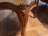 a chair that is sitting on the floor in the room
