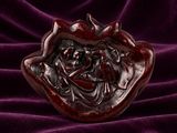 an image of a small bowl sitting on top of a purple cloth
