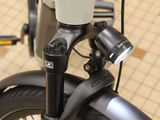 a close up of a bicycle with a light on it