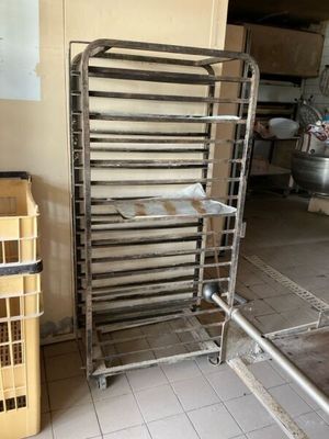 an image of a kitchen with a rack of baking pans
