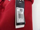 a red shirt with a barcode on it on a hanger