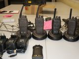 many different types of walkie talkies sitting on a table