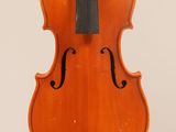 a close up of a violin with a bow on a white background
