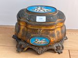 a box with a picture on it sitting on a wooden floor